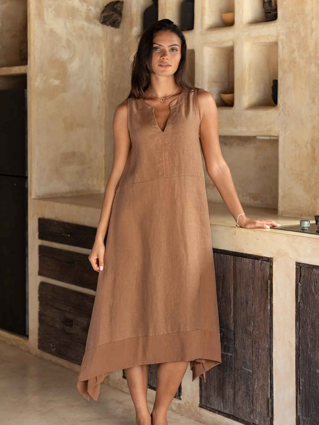 Model wears Inez Linen Midi Dress in Desert Sand