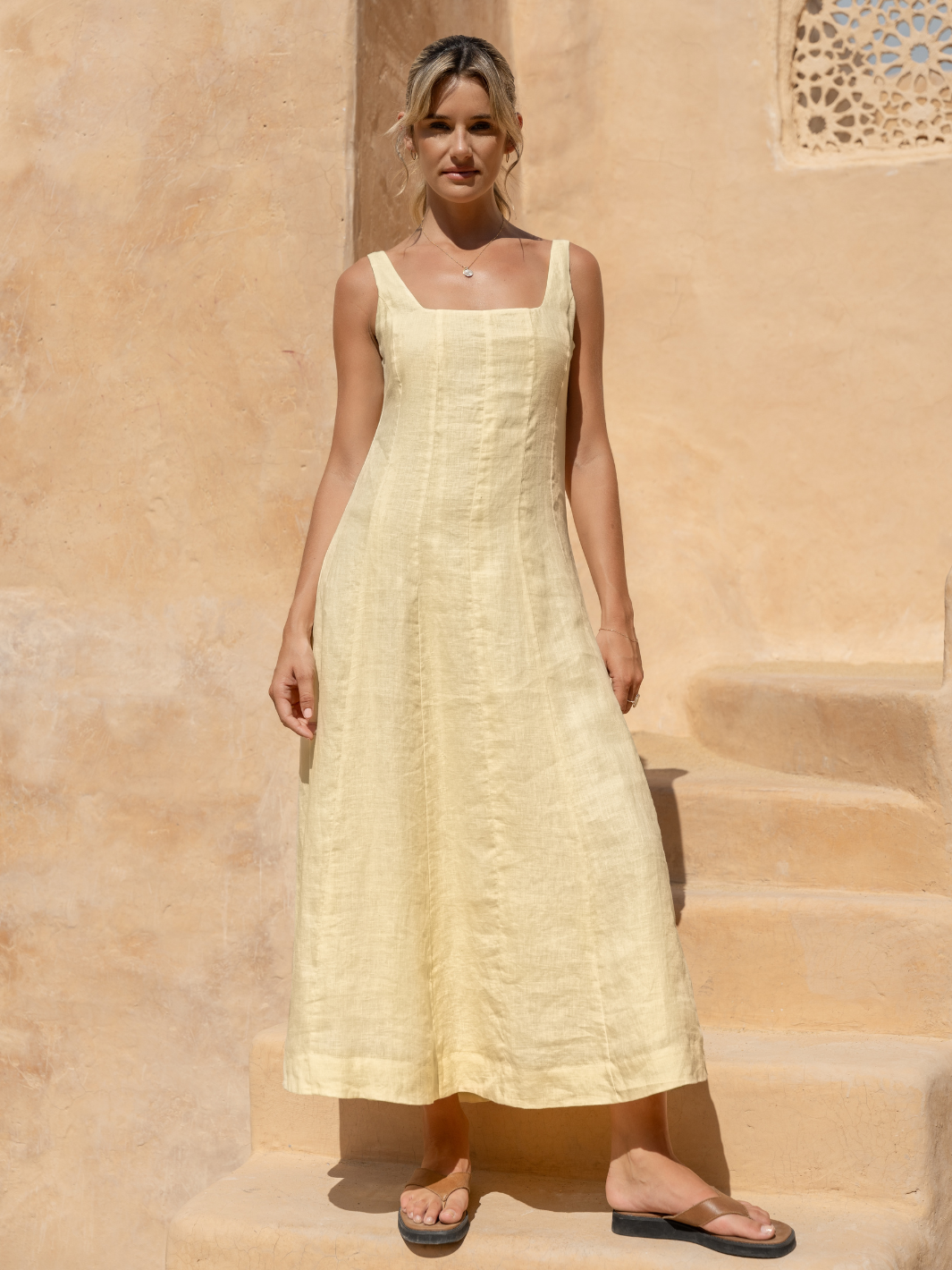 Model wears Rosalina Linen Midi Dress in Lemon