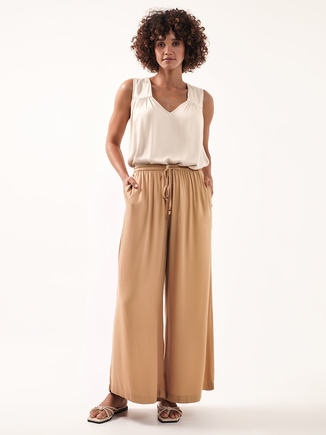 Model wears Kasbah Ecovero™ Pants in Camel