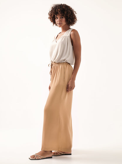 Model wears Kasbah Ecovero™ Pants in Camel