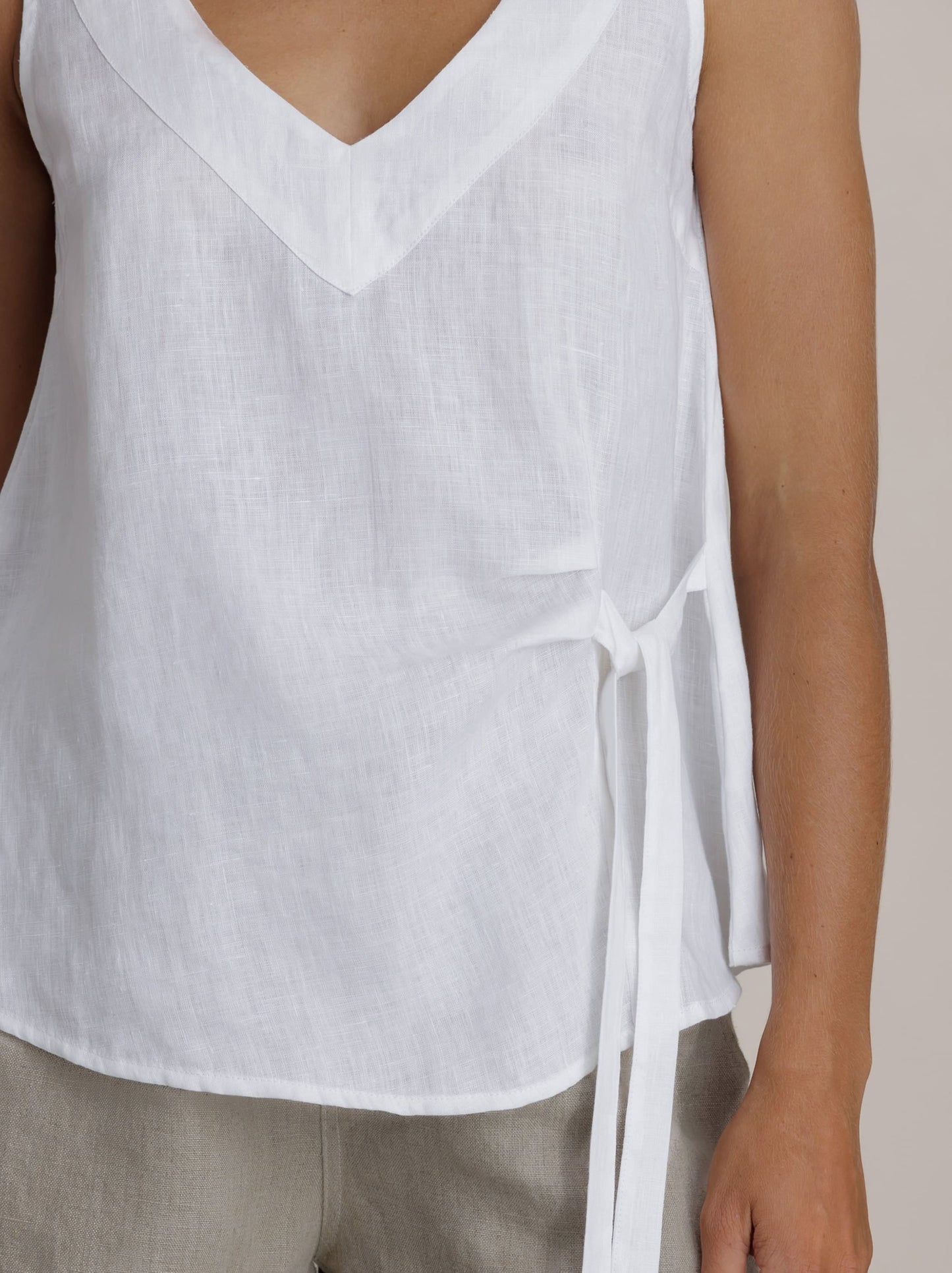 Model wears Mandalay Linen Top in White