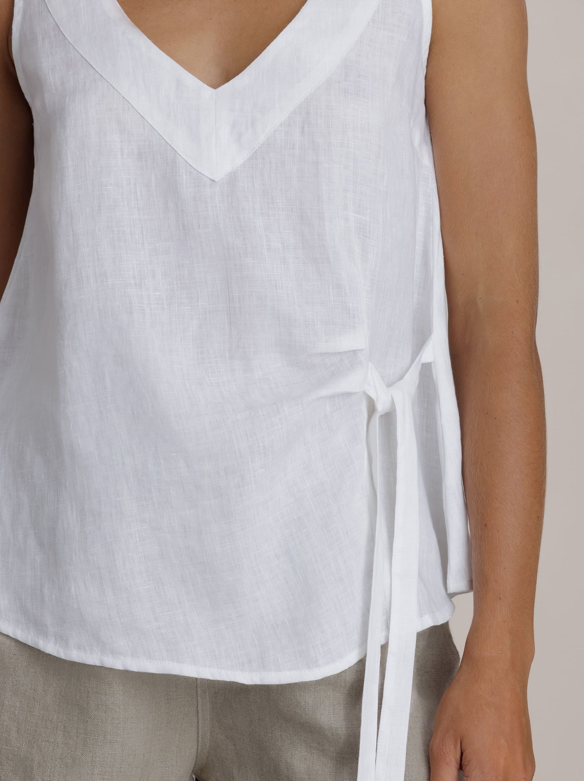 Model wears Mandalay Linen Top in White