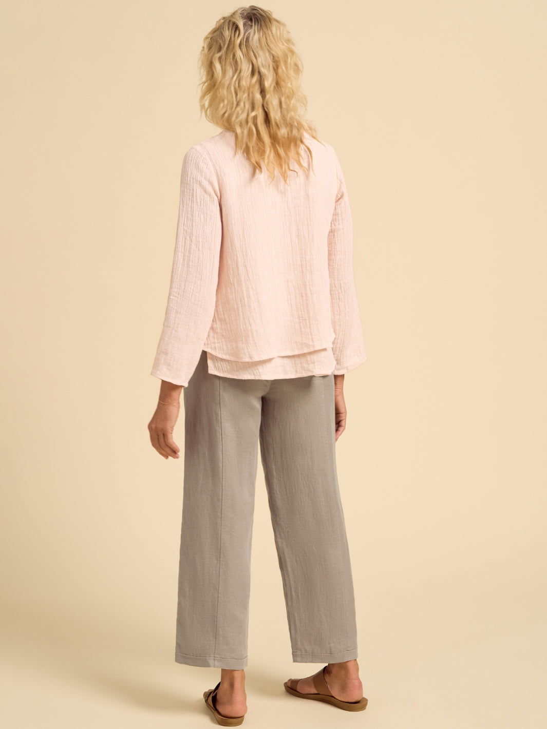 Model wears Viola Linen Top in Coral