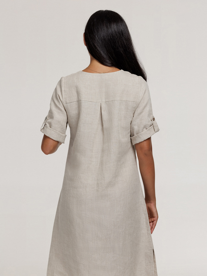 Model wears Elyse French Linen Midi Dress in Flax